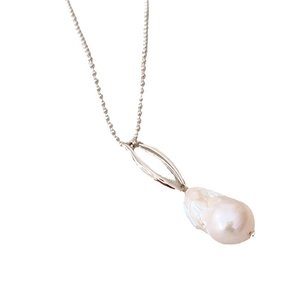 Baroque irregularly shaped natural pearl necklace with silver streamlined pendant and bead chain