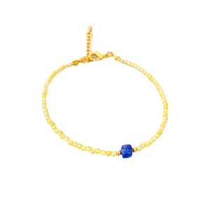 Minimalist gold beaded bracelet featuring a square blue natural stone with adjustable clasp