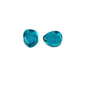 Minimalist 925 silver teardrop glass studs in deep teal blue on white background