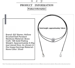 Macro view of silver brushed hollow sphere pendant necklace with detailed measurements