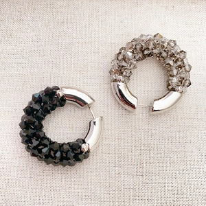 Handmade C-shape beaded hoop earrings in black and champagne crystal for a modern look