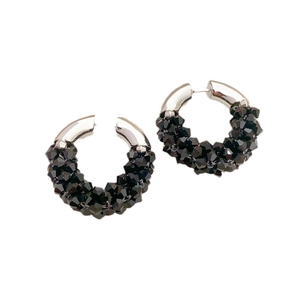 Handmade black beaded hoop earrings with faceted crystals on silver metal base