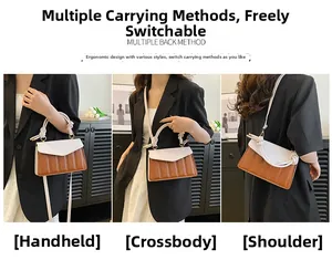 Detail view of color-block handbag showing hand-carry, crossbody and shoulder styles
