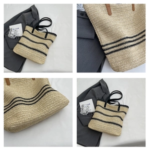 Detailed views of a woven straw tote bag with black stripes and slender shoulder straps