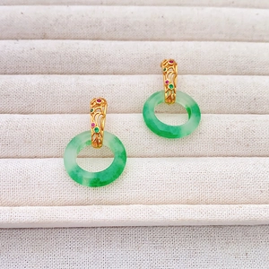 Elegant gold-plated earrings with emerald-green jade rings and ruby accents