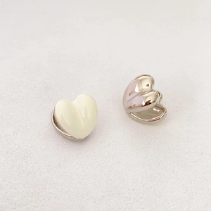 Minimalist double-sided heart-shaped enamel drop earrings in cream white and shiny silver
