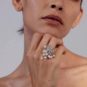 Elegant silver tassel ring featuring radiant pearls and sparkling zircon accents