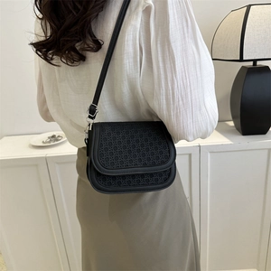 Retro black woven texture saddle bag with adjustable shoulder strap and metal buckle