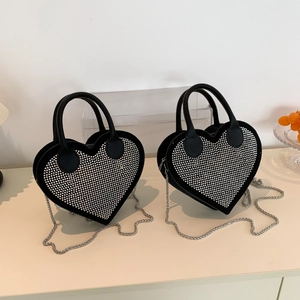 Sparkling heart-shaped crossbody bag in black leather with silver rhinestones and chain