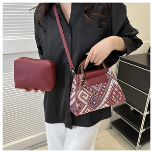 Ethnic woven tote bag with red geometric pattern, wooden handles and matching pouch