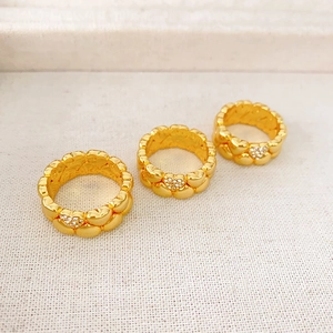 Three-piece gold double-layered heart-shaped rings set with micro-inlaid diamonds