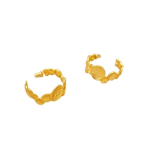 Golden C-shaped earrings with hammered matte discs in a luxury minimalist style