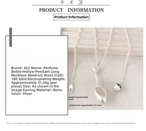 Detail of silver long necklace with hollow perfume bottle pendant and black floral bead