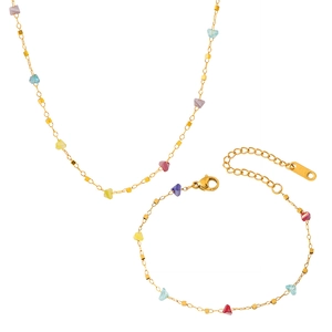 Set di gioielli con collana e bracciale in acciaio dorato e pietre colorate