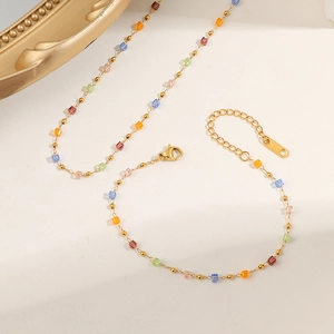 Colorful crystal bead necklace with gold lobster clasp and square charms in various hues