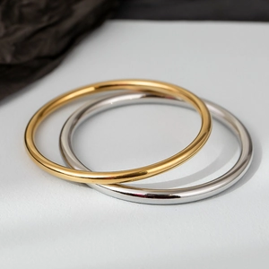 Minimalist 4mm polished stainless steel bangles in gold and silver finish set