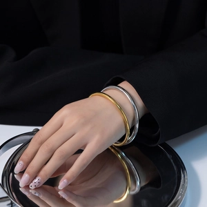 Minimalist 4mm polished stainless steel bangles in gold and silver set for women