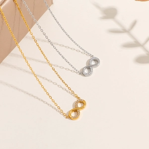 Infinity heart necklaces in gold and silver finish with sparkling diamond accents