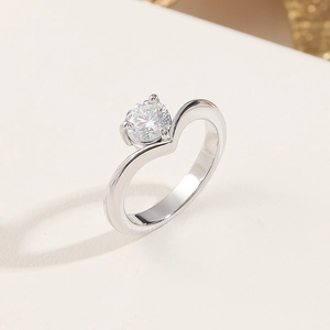 Elegant wave-shaped titanium steel ring with a round brilliant cubic zirconia stone