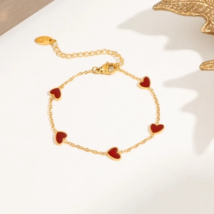 Gold titanium steel bracelet with five red heart charms and K18 engraving detail
