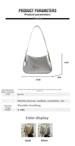 Detailed view of silver crescent underarm bag with dimensions 23x15x6cm and strap height