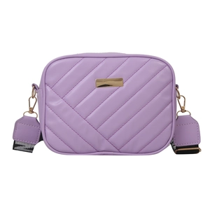 Lavender quilted crossbody camera bag with wide patterned strap and gold hardware