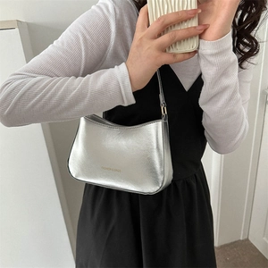 Minimalist metallic silver shoulder bag for women with polished finish and fashion text