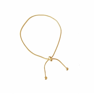 Minimalist adjustable gold snake bone chain bracelet with pull-style slider closure