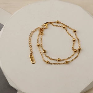 18K gold double-layered beaded titanium steel bracelet with polished K18 tag