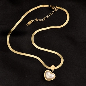 Golden snake chain necklace with heart pendant featuring mother of pearl and Love engraving