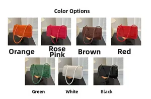 Macro view of seven assorted colors of small faux crocodile pattern underarm bags
