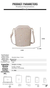 Detail view of woven straw bucket bag with daisy patterns and specific size dimensions