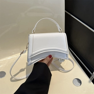 Sac à main sablier blanc structuré avec poignée élégante et bandoulière amovible