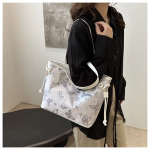 Large butterfly print tote bag with white drawstrings and shoulder straps for women