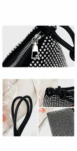 Detalle de diamantes de imitación plateados y asa de cuero negro en el bolso de fiesta
