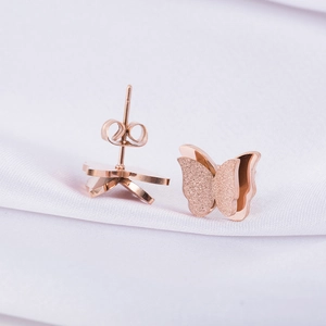 Elegant rose gold double butterfly stud earrings with matte and polished texture details