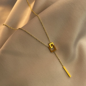 Minimalist 18K gold plated titanium steel necklace with interlocking square pendants