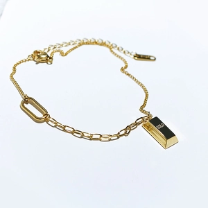 18K gold plated titanium steel anklet featuring a unique gold brick pendant and adjustable chain