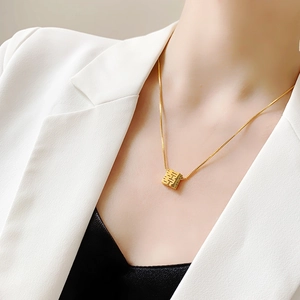 Golden Double Happiness necklace for women featuring a minimalist Chinese Xi square pendant