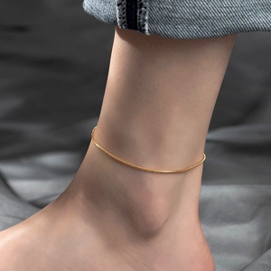 Minimalist gold snake chain anklet for women made of durable polished titanium steel