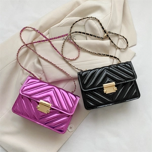 Quilted patent leather crossbody bags with V-shaped stitching and gold chain straps