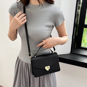 Chic black crocodile embossed mini handbag with gold heart lock for women on-shoulder