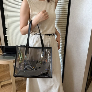 Transparent PVC tote bag with colorful rhinestones and black leather trim for summer fashion