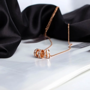 Rose gold triple interlocking ring necklace with crystal paved pendants for women