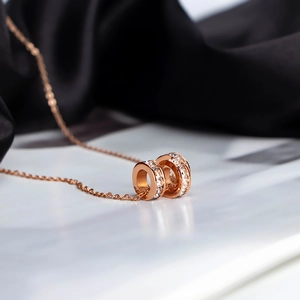 Minimalist rose gold double ring necklace with sparkling pavé crystals for women