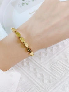 Minimalist gold-plated stainless steel snake chain bracelet with Love engraved blocks