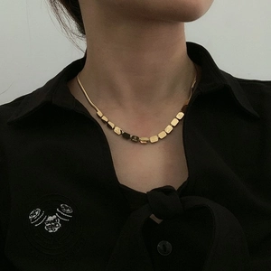 18K gold plated titanium snake chain necklace with square LOVE pendants on model