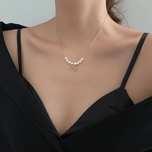 Elegant gold titanium steel necklace with white pearls and a Fu character pendant