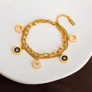 Double-layered 18K gold plated stainless steel bracelet with Roman numeral charms