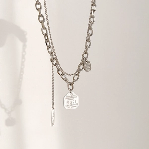 Double-layered titanium steel necklace with square pendants and vintage plate tags
